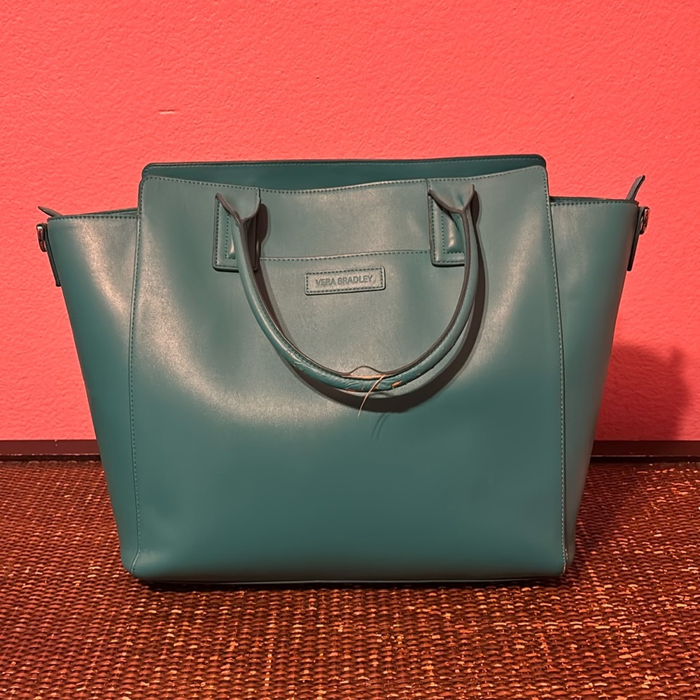 Some peeling on handles gently used. No stains inside the bag